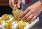 Gold Rises 1% Weekly as Crude Oil Prices Ease